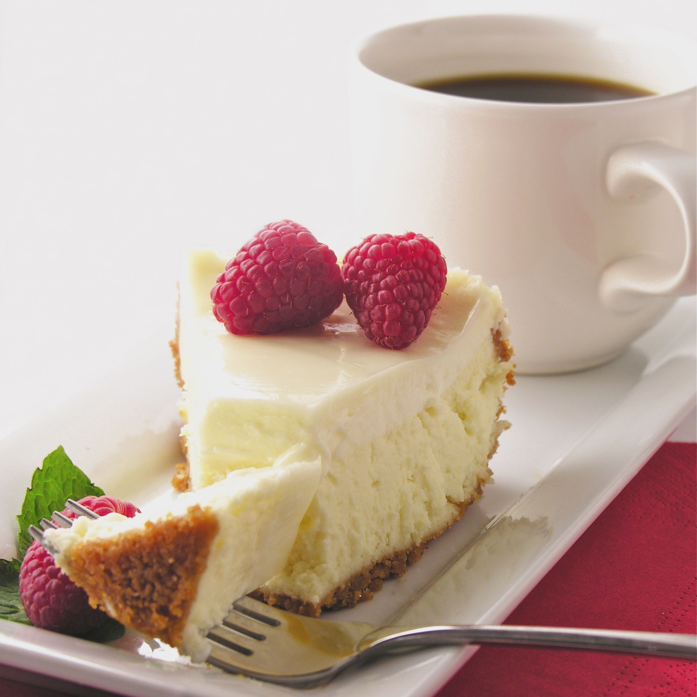 Classic Cheesecake with Creamy Sour Cream Topping!