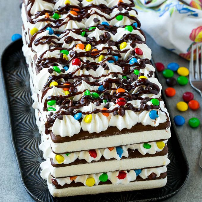 This ice cream sandwich cake is layers of ice cream sandwiches, whipped ...